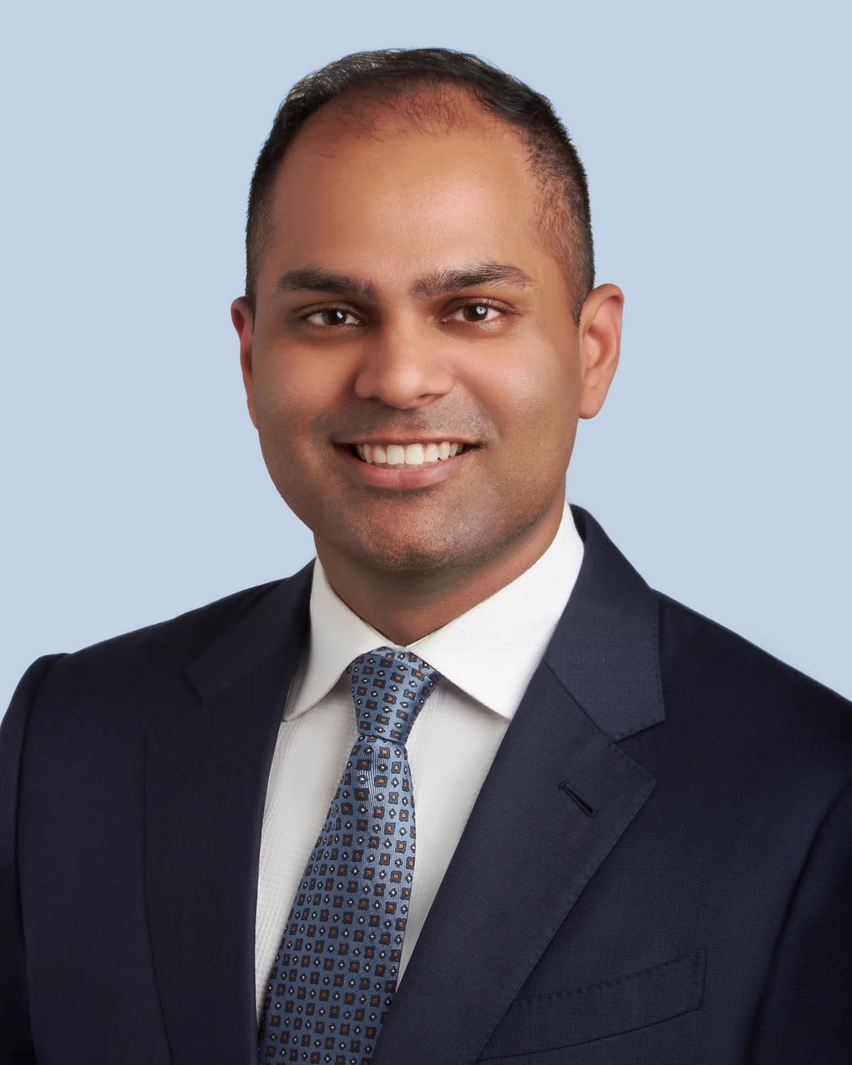 Dr. Lekhaj Daggubati, neurosurgeon, in clinic
